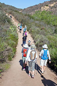 Guests enjoying a guided nature hike at The Pearl Laguna