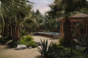 Outdoor dining at Two Bunch Palms with views of the desert landscape.