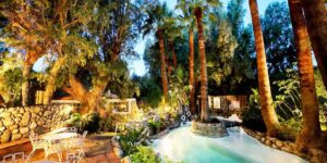 "Mineral-rich hot springs pool at Two Bunch Palms, known for its healing properties."